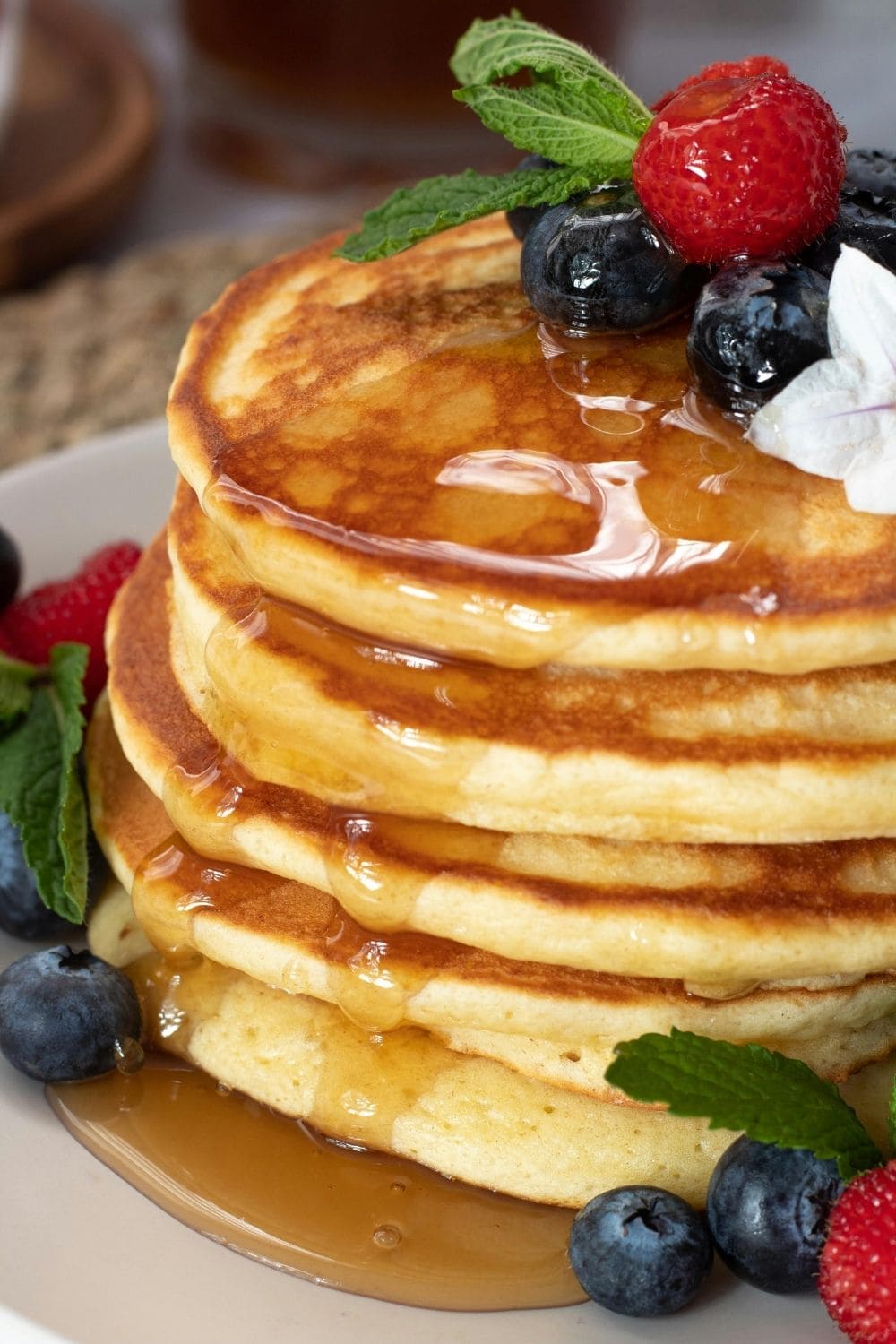 Stack of pancakes with syrup.