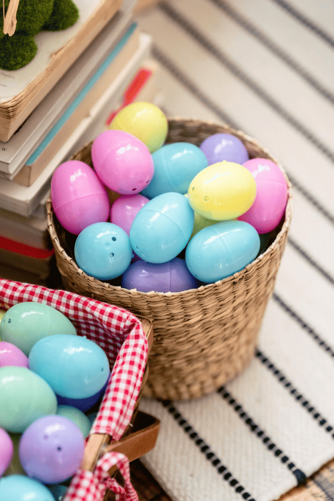 Colorful plastic Easter eggs in baskets