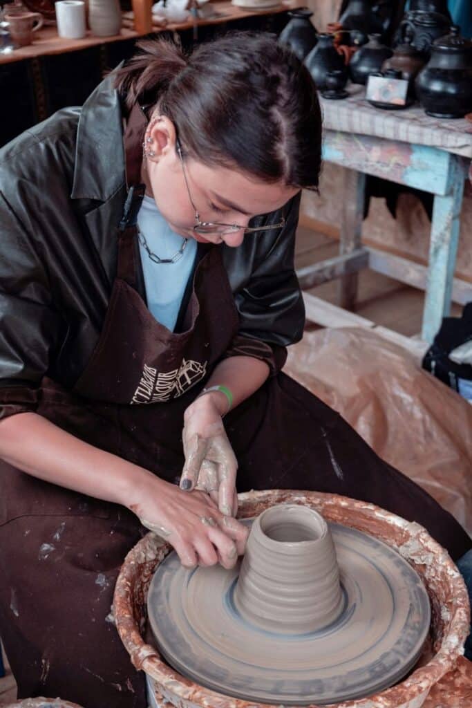 Woman doing pottery as a fun girly hobby