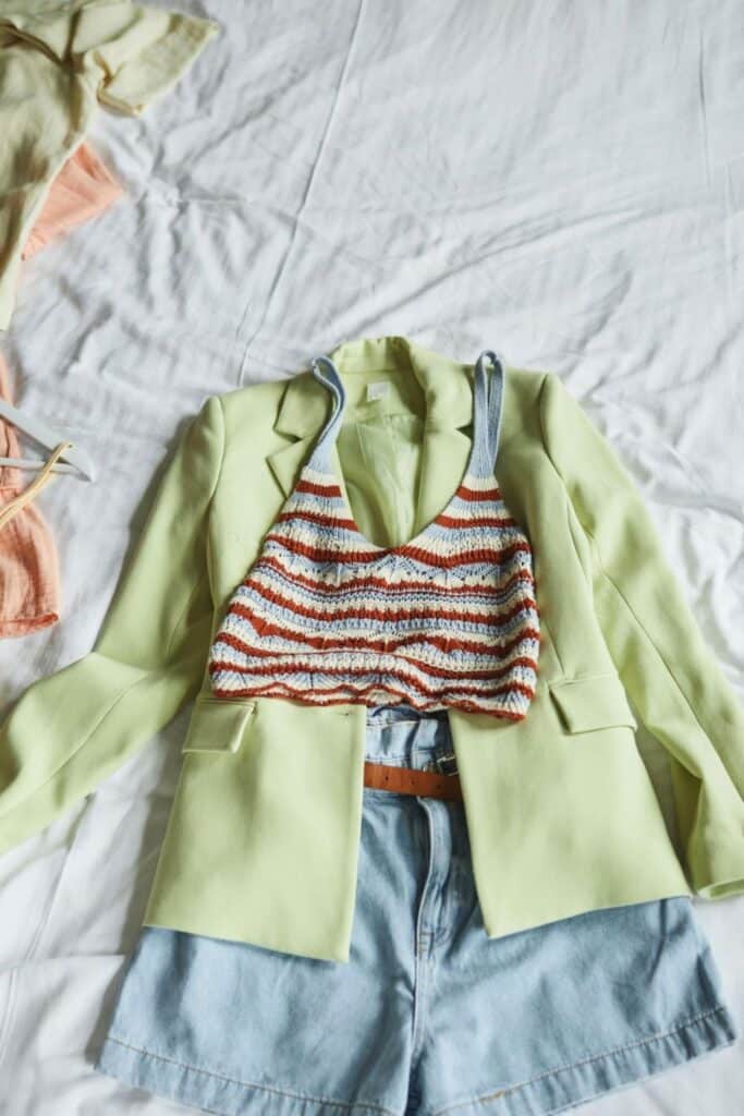 Outfit laid on top of bed