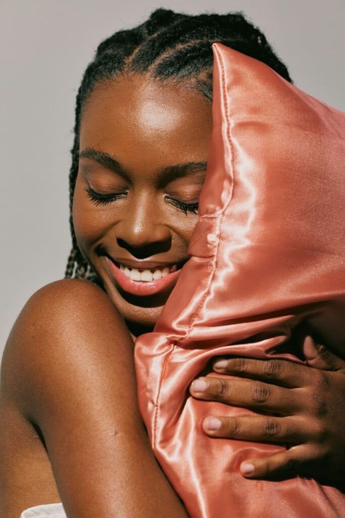 Woman with cozy pillow