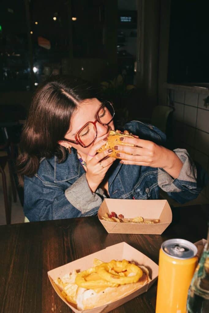 Woman eating a burger