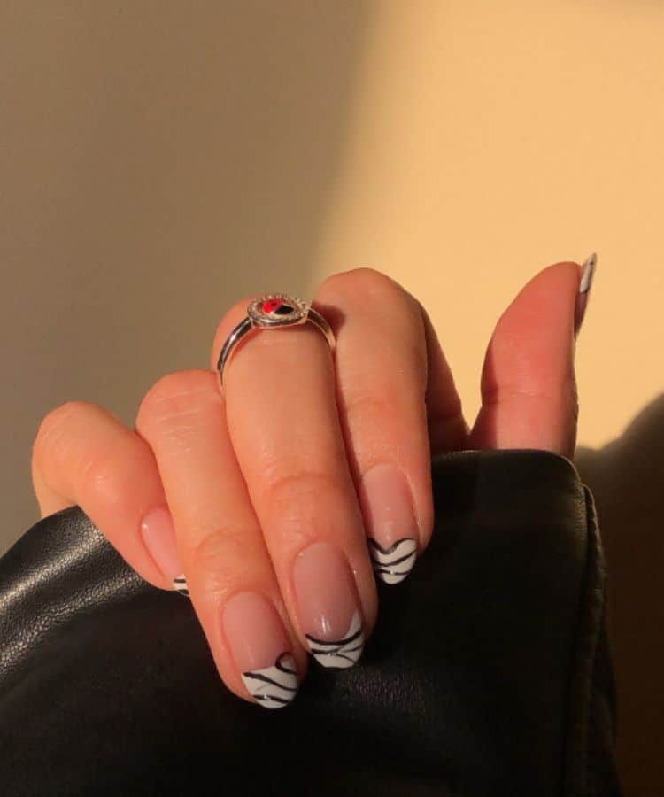 Abstract zebra print French tips